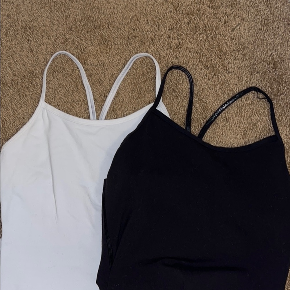 Black and white Ivivva tanks